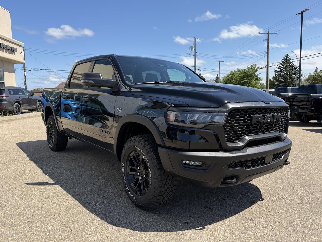 2026 Ram 1500 Rebel Crew Cab 4x4 | V8 Hybrid | 12IN Display | NAV | Backup Camera | Off-Road Suspension Redwater AB