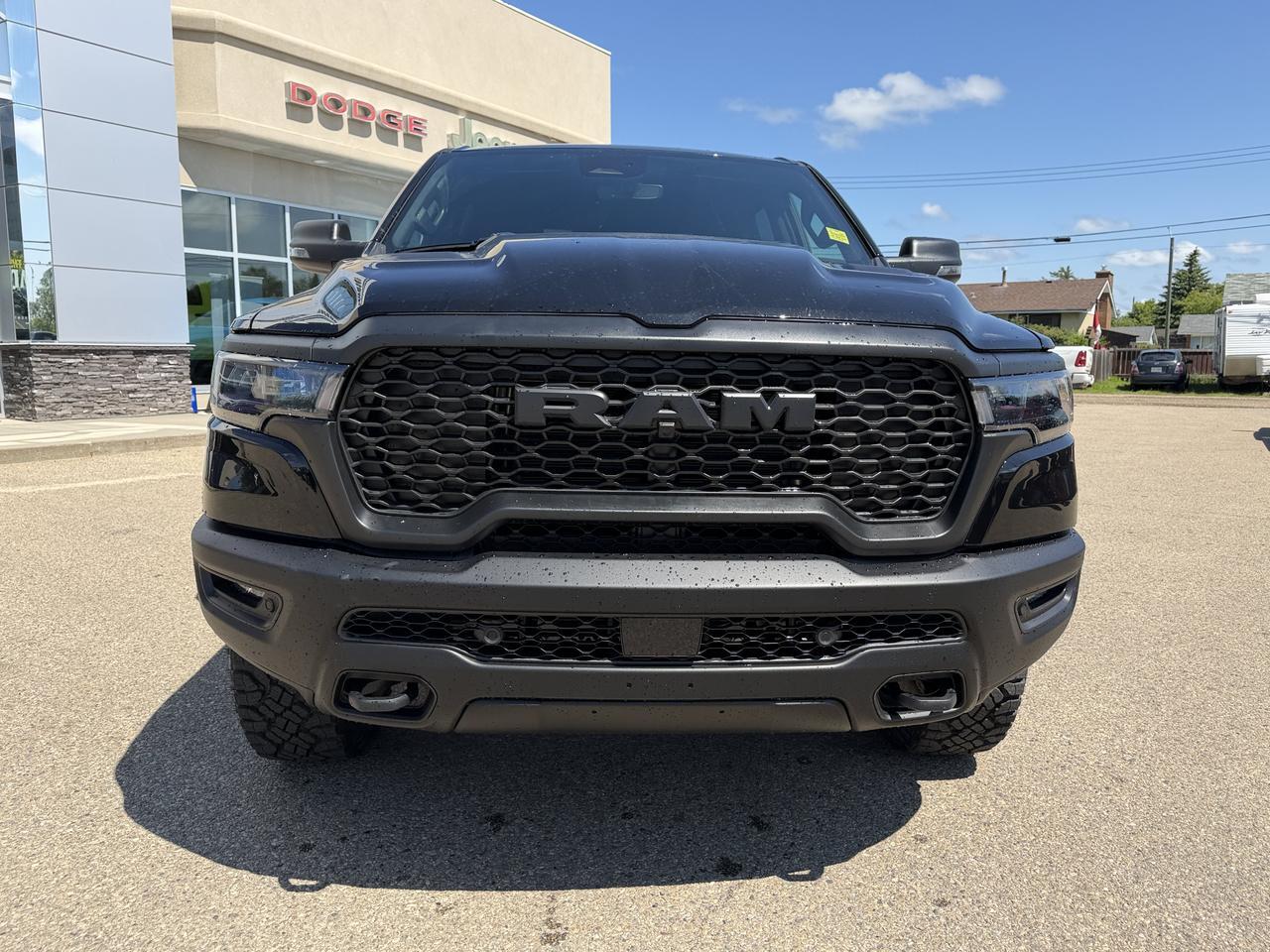2026 Ram 1500 Rebel Crew Cab 4x4 | V8 Hybrid | 12IN Display | NAV | Backup Camera | Off-Road Suspension Redwater AB