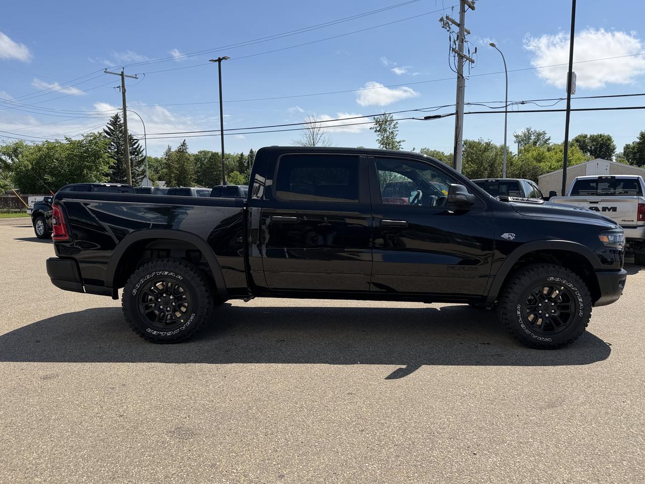 2026 Ram 1500 Rebel Crew Cab 4x4 | V8 Hybrid | 12IN Display | NAV | Backup Camera | Off-Road Suspension Redwater AB