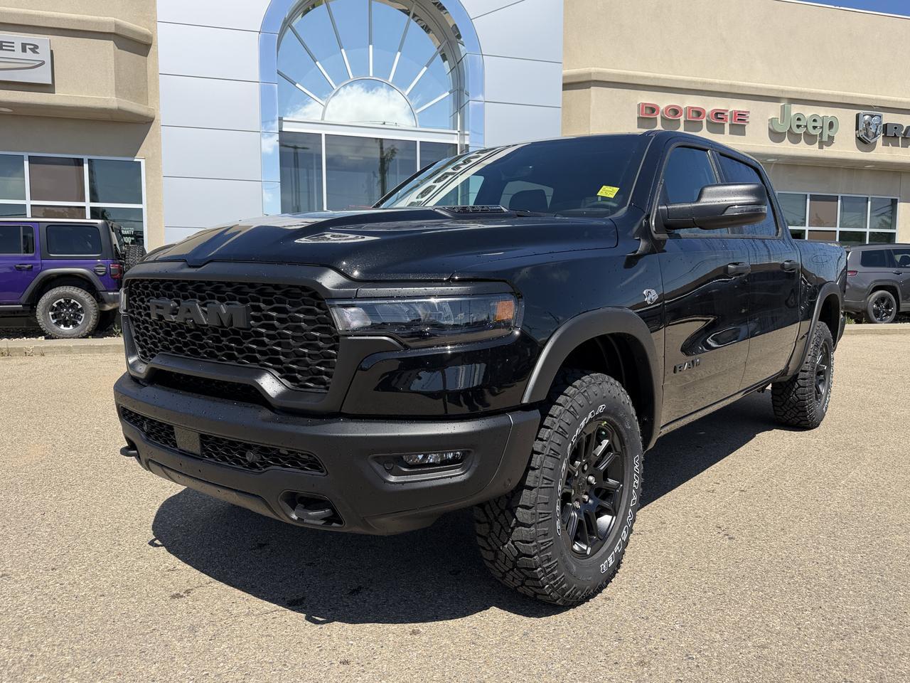 2026 Ram 1500 Rebel Crew Cab 4x4 | V8 Hybrid | 12IN Display | NAV | Backup Camera | Off-Road Suspension Redwater AB