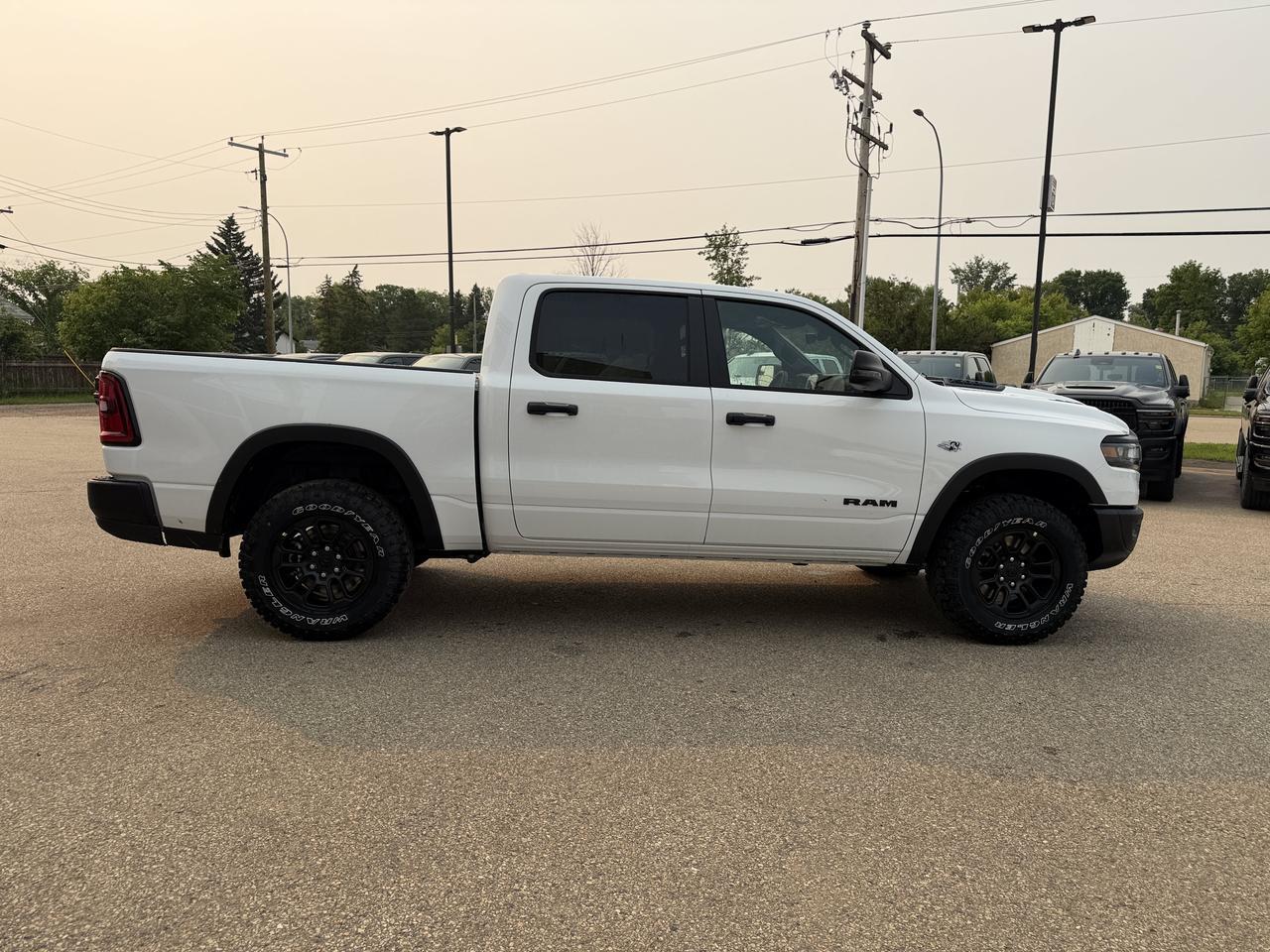 2026 Ram 1500 Rebel Crew Cab 4x4 | V8 Hybrid | Off-Road Suspension | Touchscreen Display | NAV Redwater AB