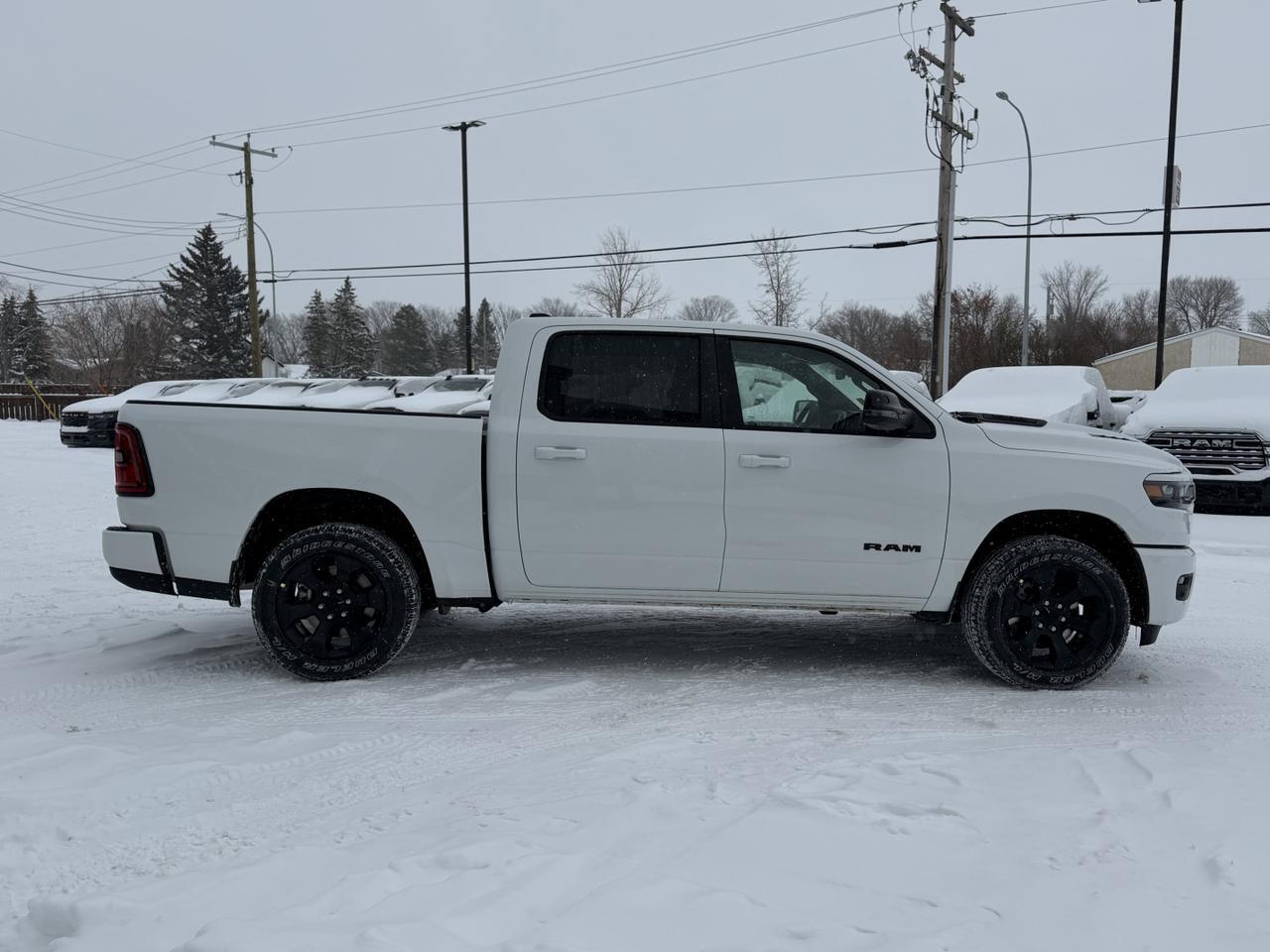 2026 Ram 1500 Sport Crew Cab 4x4 | 3L Hurricane | Pano Sunroof | NAV | Heated Seats | Alpine Audio Redwater AB