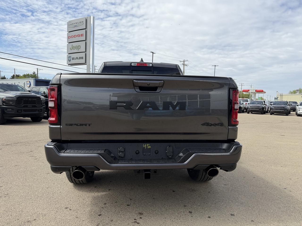 2026 Ram 1500 Sport Crew Cab 4x4 | HEMI V8 | Pano Sunroof | 12IN Display | NAV | Heated Seats | Granite Crystal Redwater AB