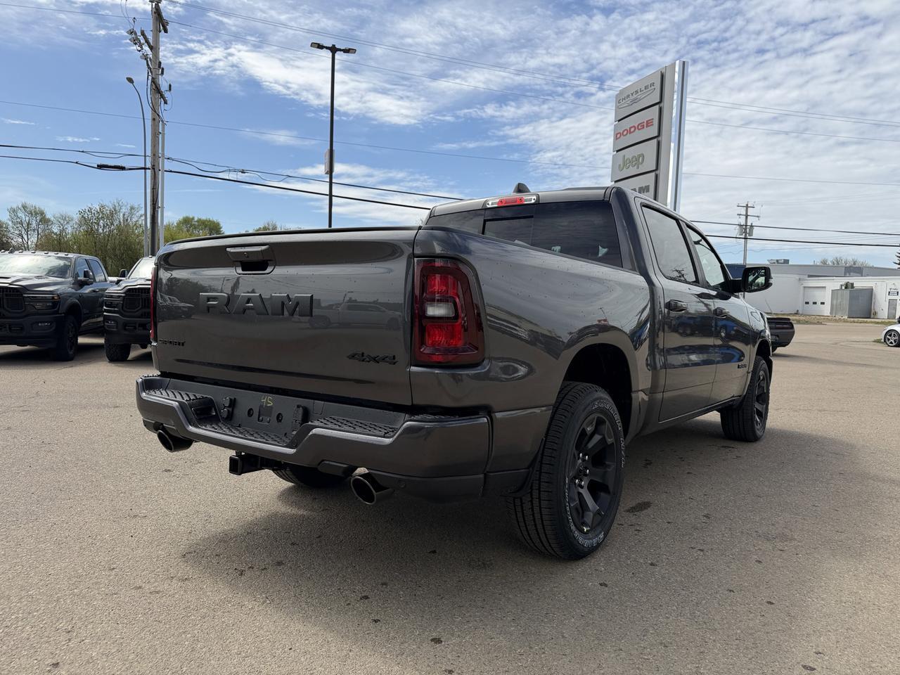 2026 Ram 1500 Sport Crew Cab 4x4 | HEMI V8 | Pano Sunroof | 12IN Display | NAV | Heated Seats | Granite Crystal Redwater AB