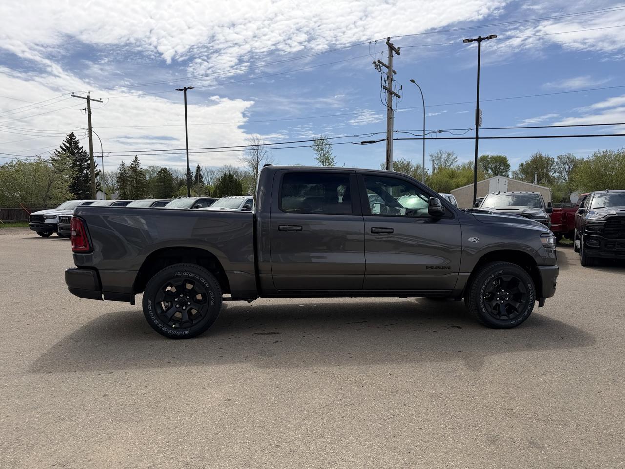 2026 Ram 1500 Sport Crew Cab 4x4 | HEMI V8 | Pano Sunroof | 12IN Display | NAV | Heated Seats | Granite Crystal Redwater AB