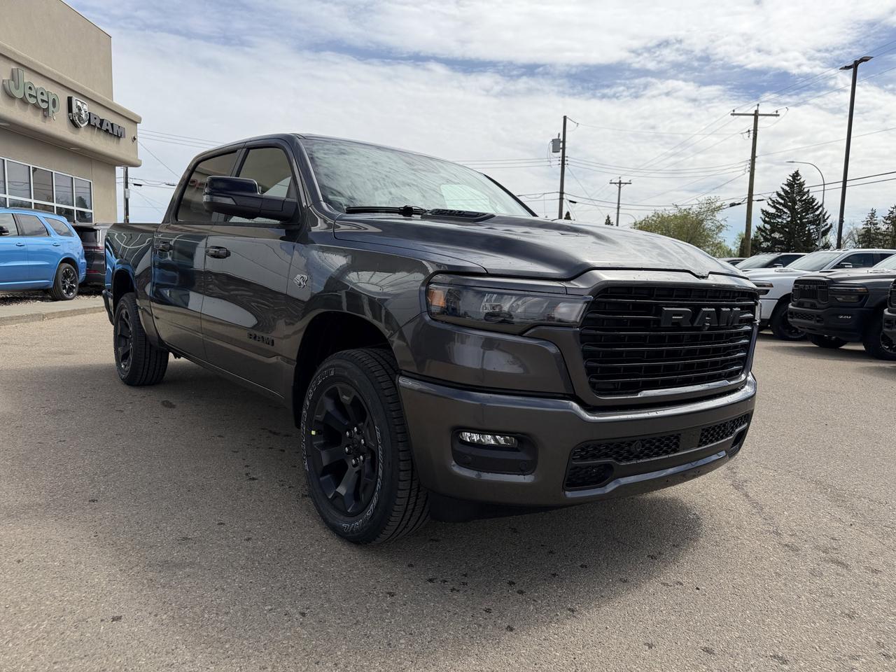2026 Ram 1500 Sport Crew Cab 4x4 | HEMI V8 | Pano Sunroof | 12IN Display | NAV | Heated Seats | Granite Crystal Redwater AB