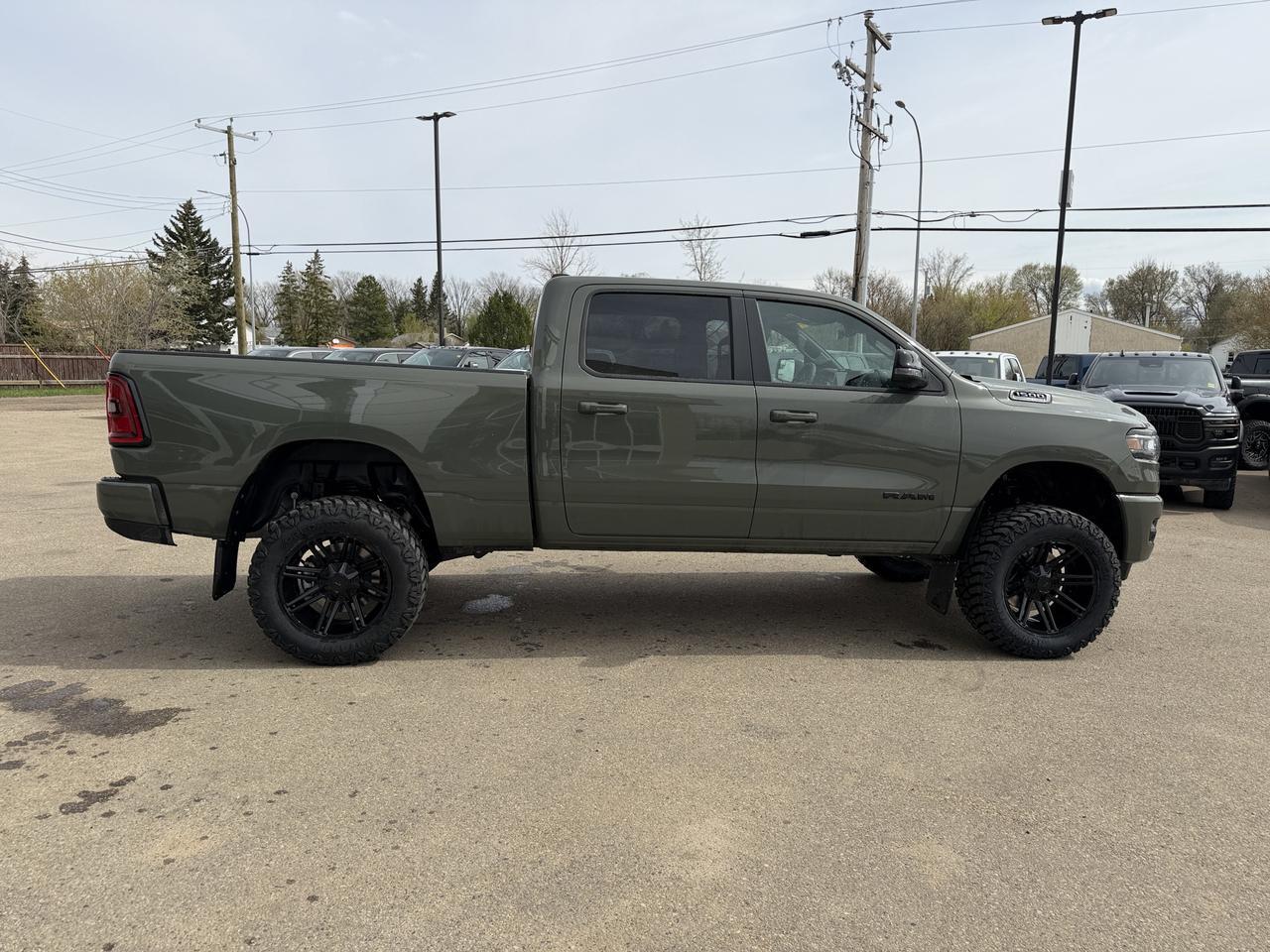 2026 Ram 1500 Sport Crew Cab 4x4 | Rig Ready Ram | 3L Twin Turbo | 12IN Touchscreen | NAV | Heated Seats Redwater AB