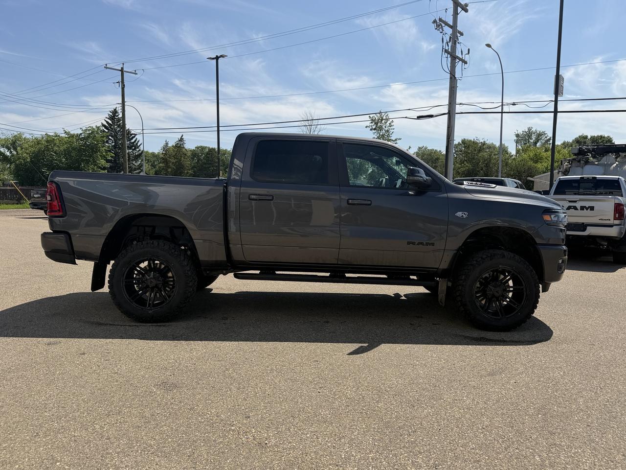 2026 Ram 1500 Sport Crew Cab 4x4 | Rig Ready Ram | KYLE | 6" Lift Kit | Hemi | 20" Wheels | 35" Tires | Pano Roof Redwater AB