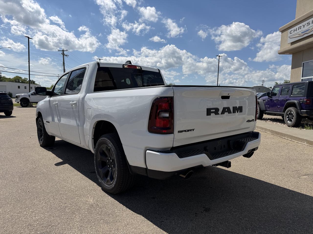 2026 Ram 1500 Sport Crew Cab 4x4 | Rig Ready Ram | RANDY CANDY | 4" Lift  | 20" Rims | 35" Tires | Heated Seats Redwater AB