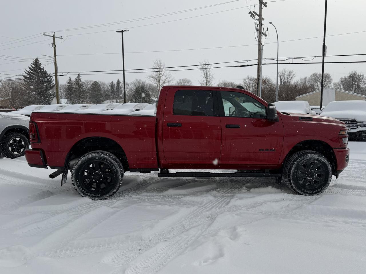 2026 Ram 2500 Big Horn Night Edition Crew Cab 4x4 | NAV | 12IN Display | 20IN Wheels | Remote Start | Molten Red Redwater AB