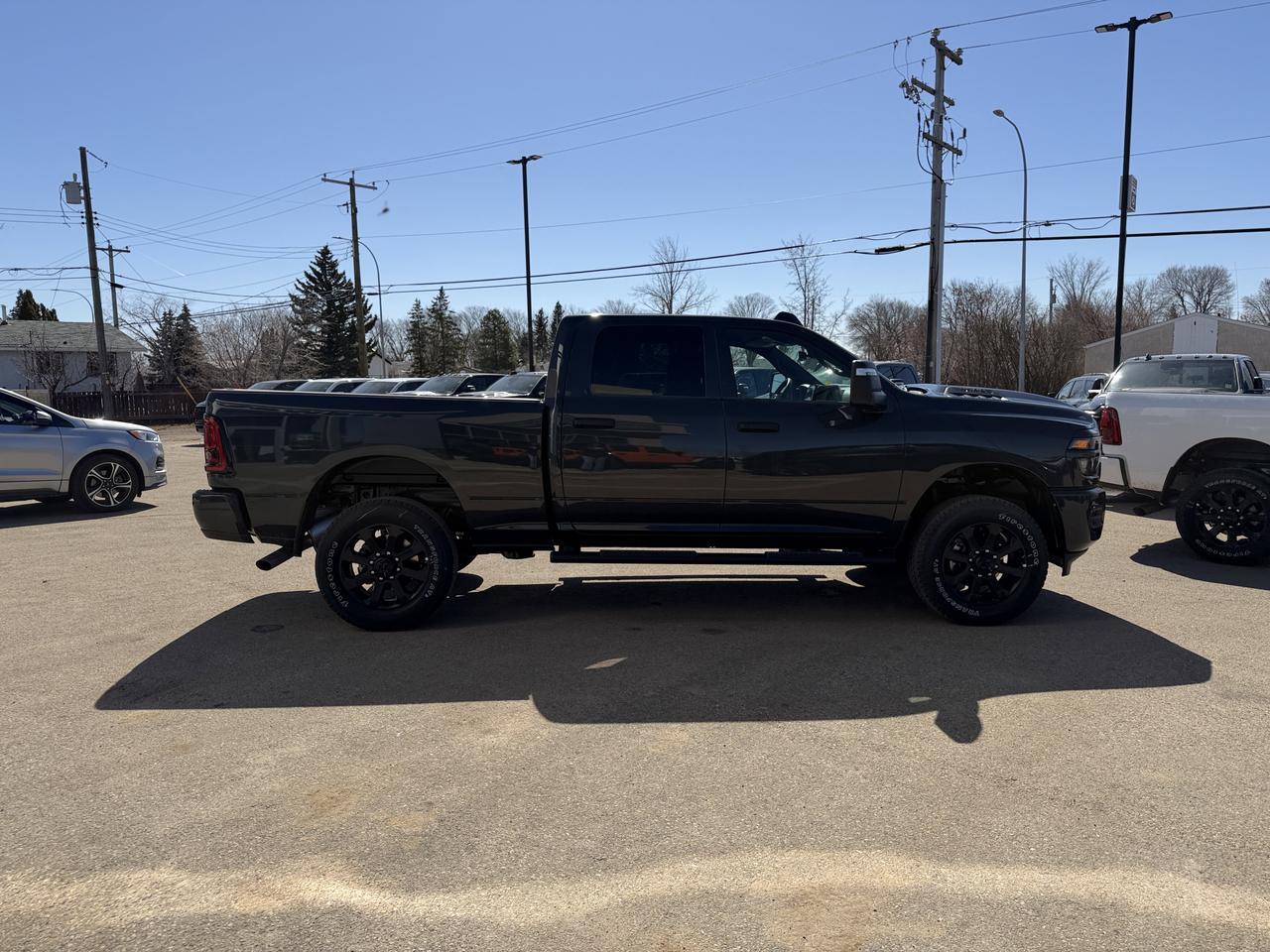 2026 Ram 2500 Black Express Crew Cab 4x4 | V8 HEMI | 12IN NAV | 20IN Black Wheels | Mopar Tubular Steps Redwater AB