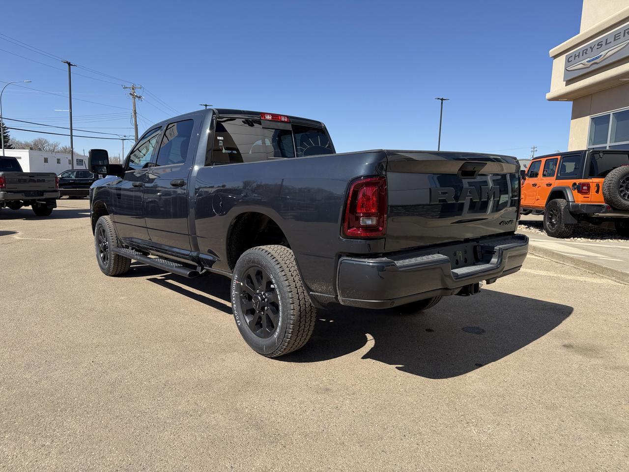 2026 Ram 2500 Black Express Crew Cab 4x4 | V8 HEMI | 12IN NAV | 20IN Black Wheels | Mopar Tubular Steps Redwater AB