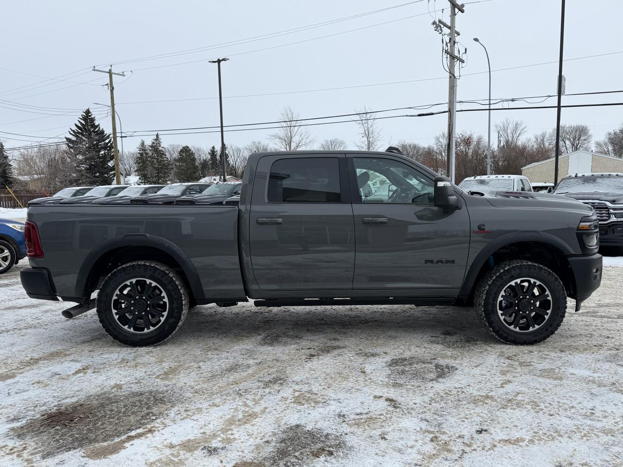 2026 Ram 2500 Rebel Crew Cab 4x4 | Towing Tech Safety Groups | Sport Hood | 12IN Display | Digital Rearview Mirror Redwater AB