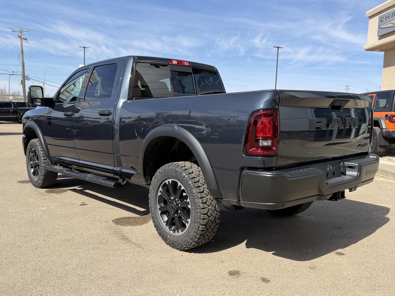 2026 Ram 2500 Warlock Crew Cab 4x4 | HEMI V8 | NAV | 12IN Display | ParkView Camera | 20IN Black Wheels Redwater AB