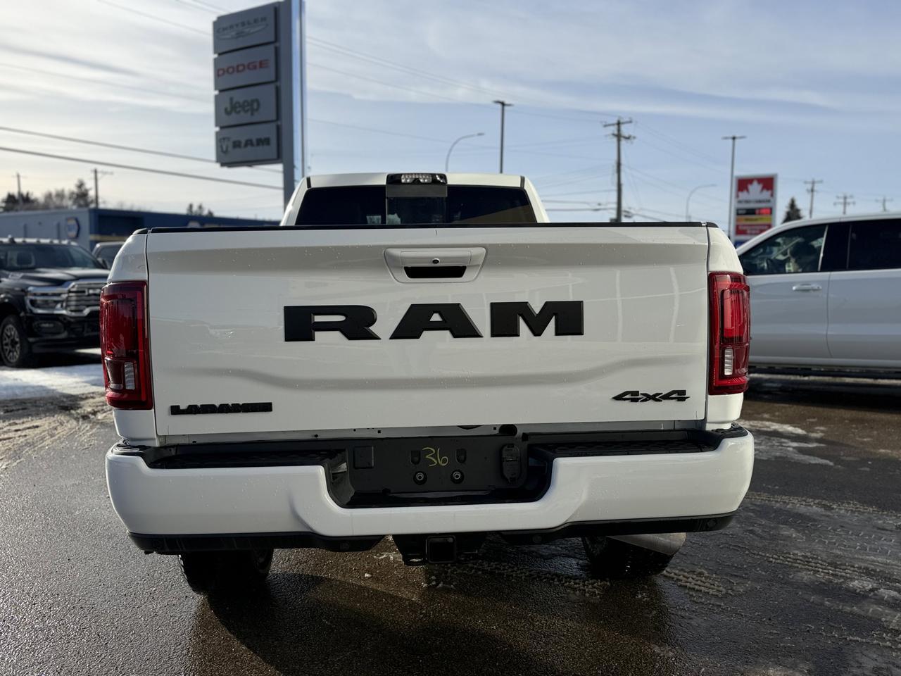 2026 Ram 3500 Laramie Crew Cab 4x4 | Cummins Turbo Diesel | Bright White | NAV | Heated Seats | Backup Camera Redwater AB