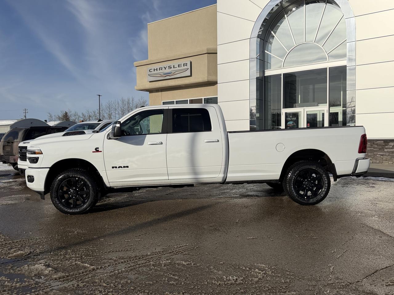 2026 Ram 3500 Laramie Crew Cab 4x4 | Cummins Turbo Diesel | Bright White | NAV | Heated Seats | Backup Camera Redwater AB