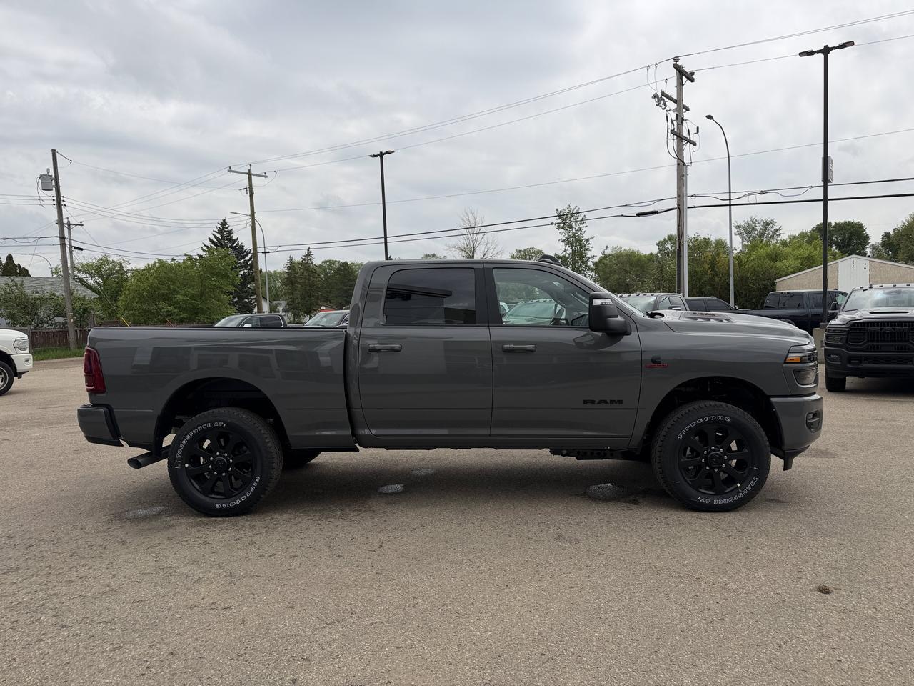 2026 Ram 3500 Laramie Crew Cab 4x4 | Rig Ready Ram | Black Leather Heated Vented Seats | Dual Charging | 5th Wheel Redwater AB
