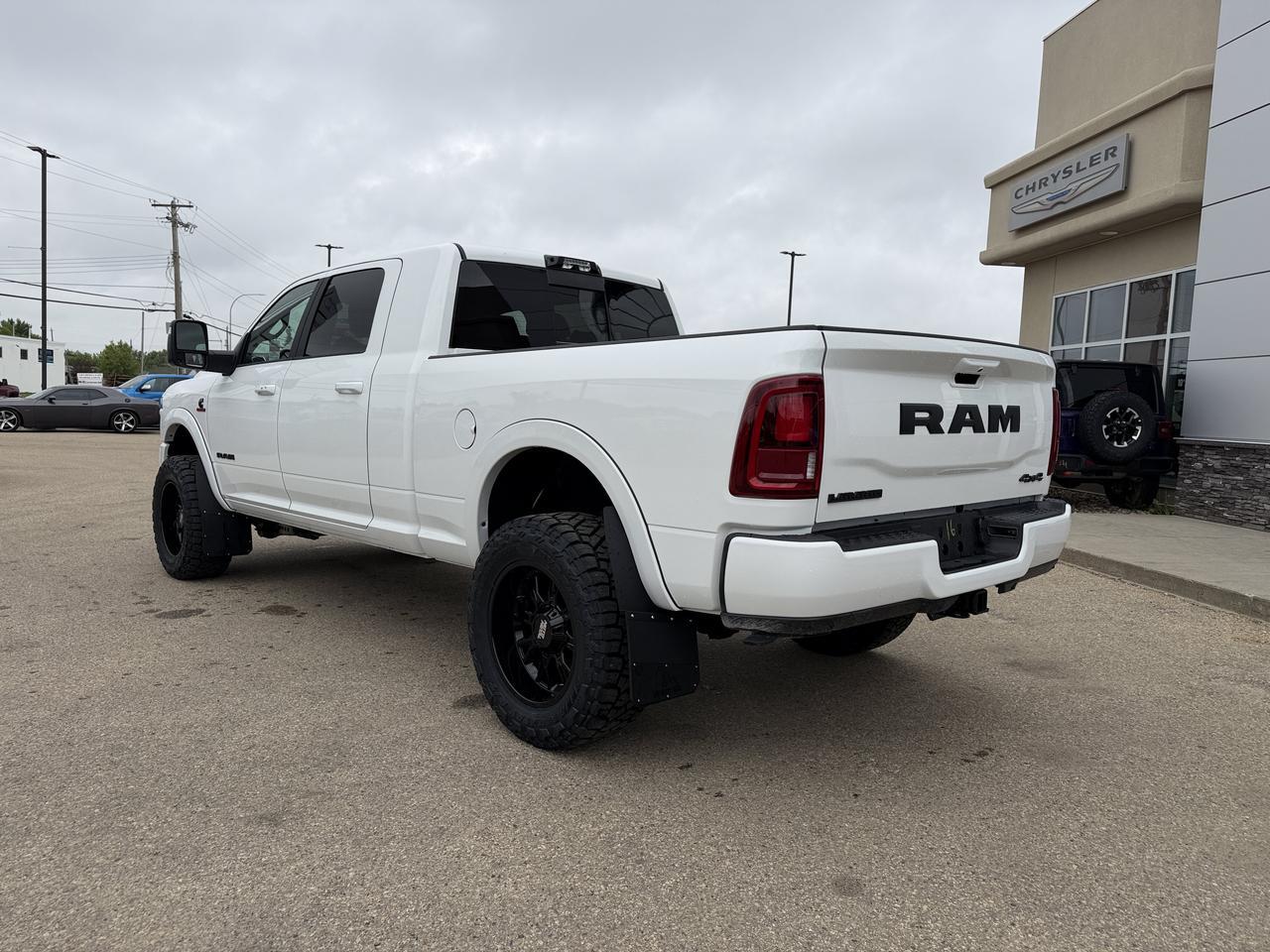 2026 Ram 3500 Laramie Mega Cab 4x4 | Rig Ready Ram | GHOST | Level Kit | 20" Moto Metal's | 35" Toyo Tire Redwater AB