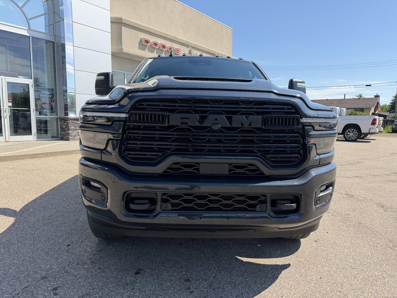 2026 Ram 3500 Laramie Mega Cab 4x4 | Rig Ready Ram | NAT DANS FANS | 3" Level Kit | 22" Rims | 35" Tires | Flares Redwater AB