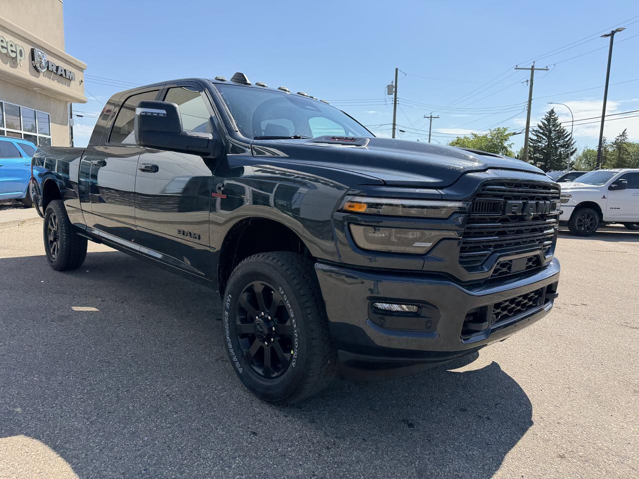 2026 Ram 3500 Laramie Mega Cab 4x4 | Rig Ready Ram | NAT DANS FANS | 3" Level Kit | 22" Rims | 35" Tires | Flares Redwater AB