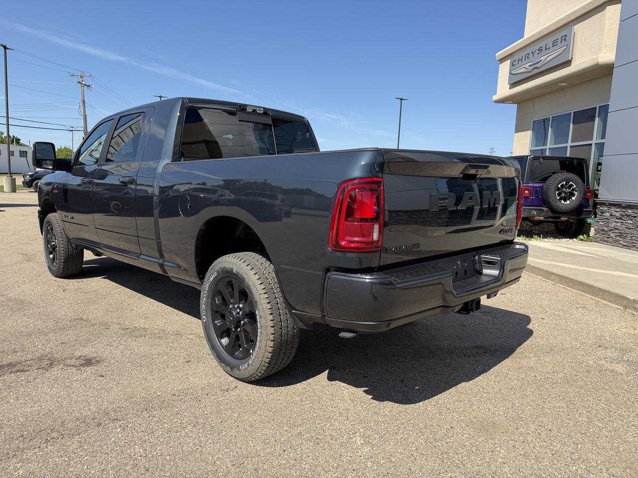 2026 Ram 3500 Laramie Mega Cab 4x4 | Rig Ready Ram | NAT DANS FANS | 3" Level Kit | 22" Rims | 35" Tires | Flares Redwater AB