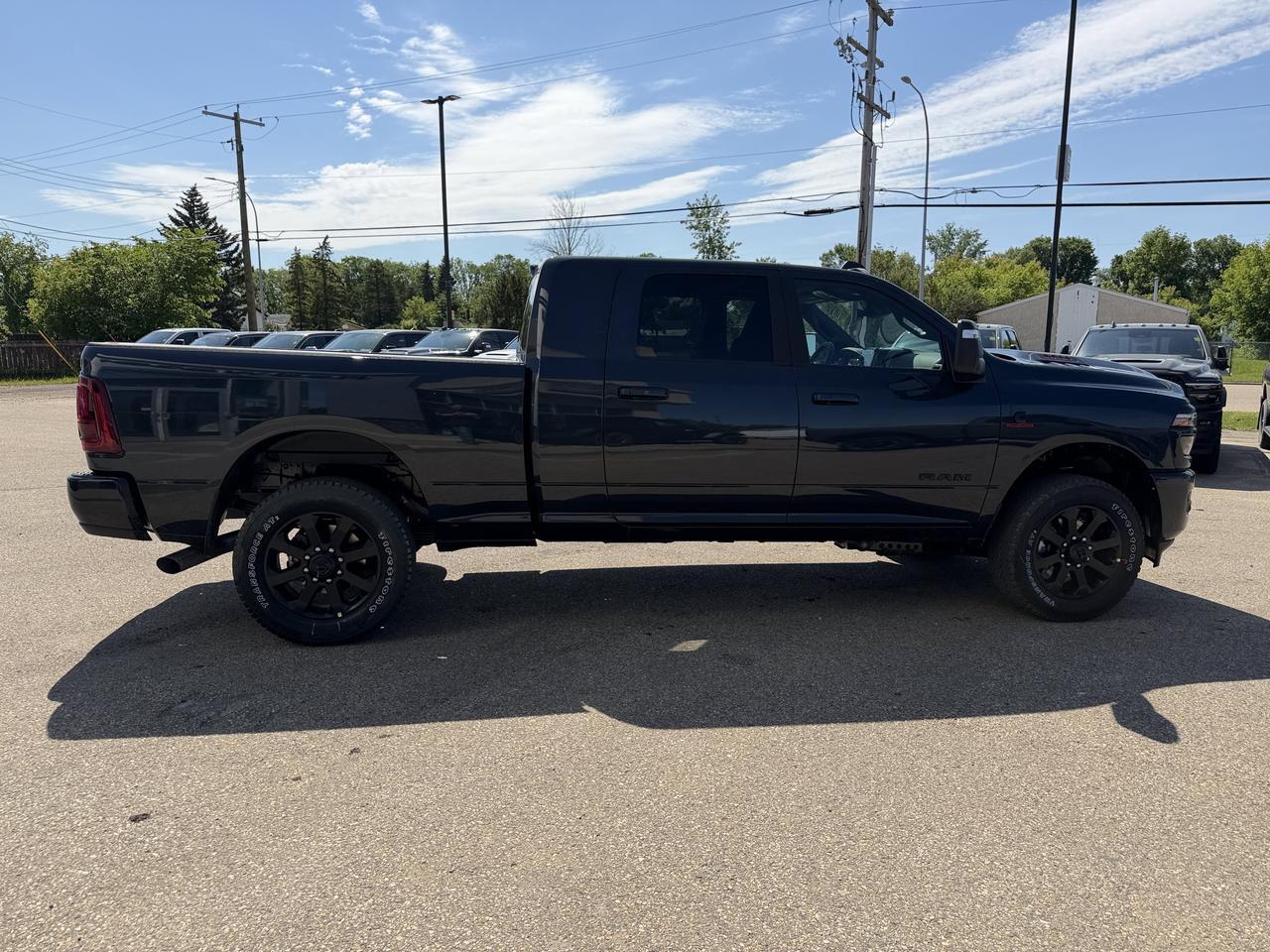 2026 Ram 3500 Laramie Mega Cab 4x4 | Rig Ready Ram | NAT DANS FANS | 3" Level Kit | 22" Rims | 35" Tires | Flares Redwater AB