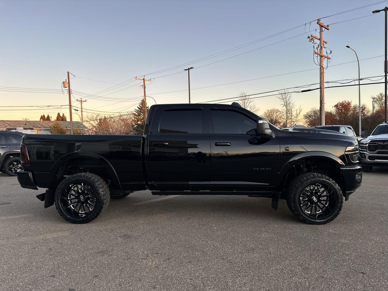 2026 Ram 3500 Laramie Night Edition Crew Cab 4x4 | BATMAN | Rig Ready Ram | Leather | Sport Hood | Sunroof Redwater AB