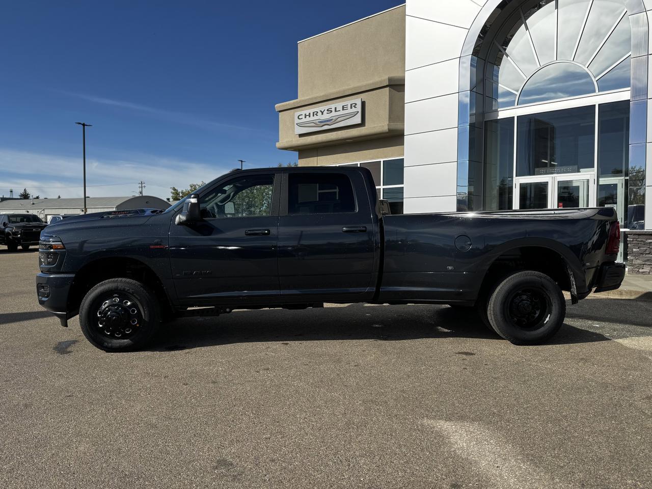 2026 Ram 3500 Laramie Night Edition Dually Crew Cab 4x4 | Cummins Diesel | Sport Hood | Sunroof | Leather Redwater AB