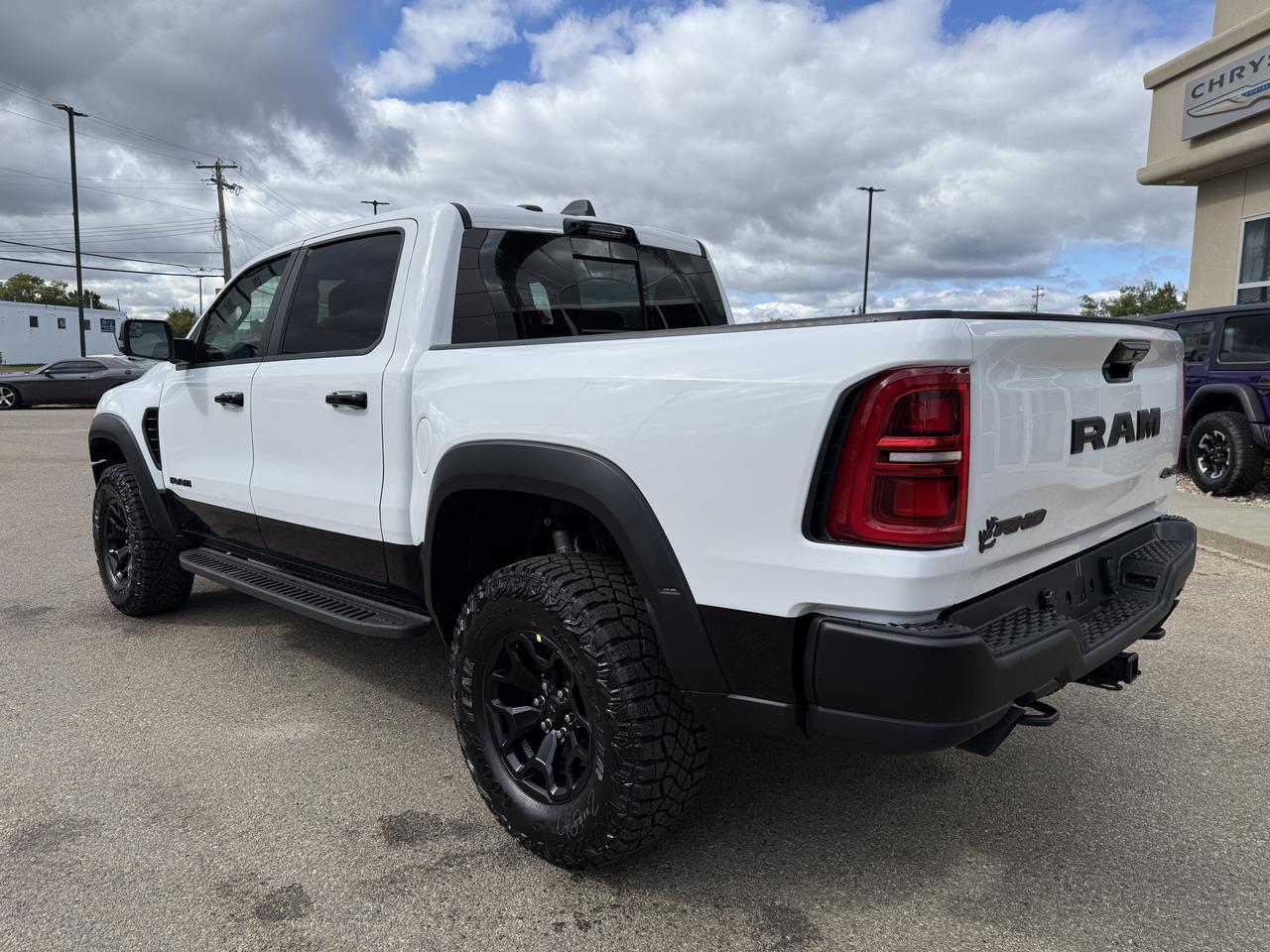 2027 Ram 1500 RHO Crew Cab 4x4 | 3L Twin Turbo | Bright White | Black Premium Leather | Pano Sunroof | NAV Redwater AB