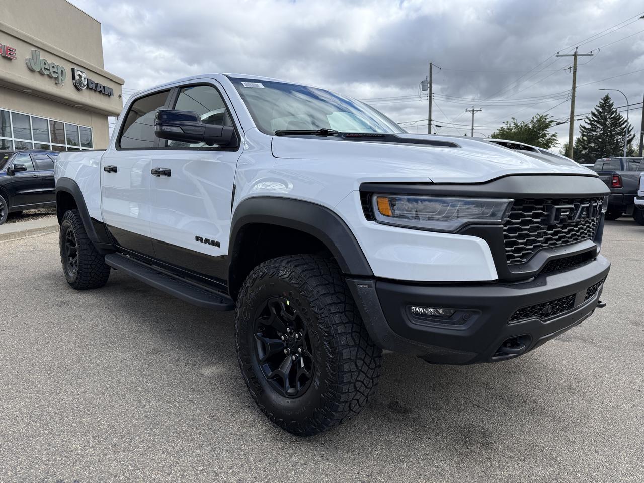 2027 Ram 1500 RHO Crew Cab 4x4 | 3L Twin Turbo | Bright White | Black Premium Leather | Pano Sunroof | NAV Redwater AB