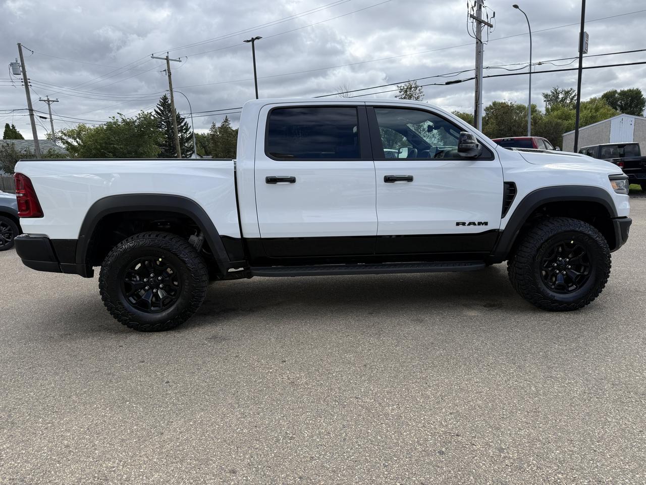 2027 Ram 1500 RHO Crew Cab 4x4 | 3L Twin Turbo | Bright White | Black Premium Leather | Pano Sunroof | NAV Redwater AB