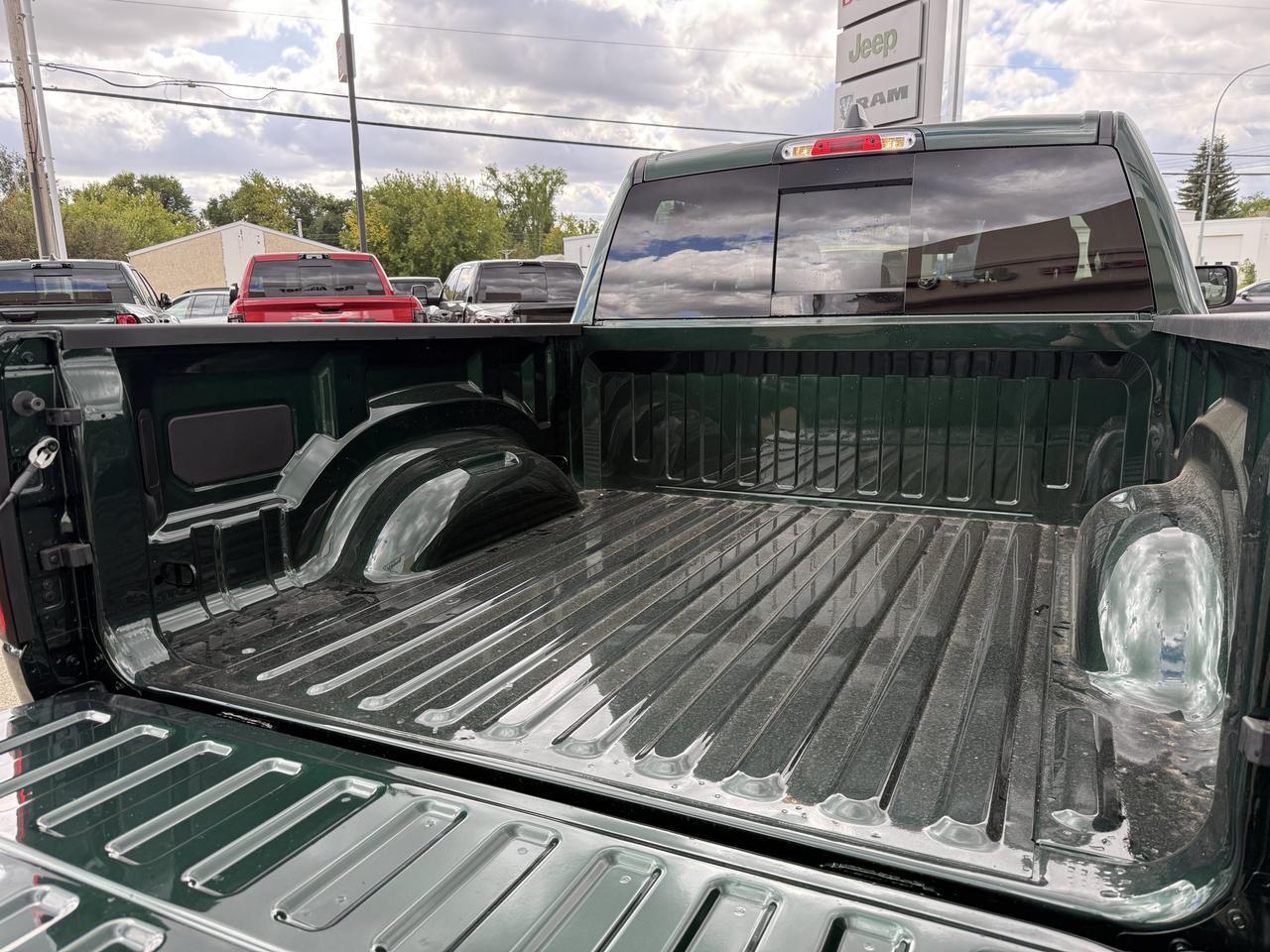2027 Ram 1500 Tradesman Quad Cab 4x4 | V6 | Serrano Green | Black Cloth Bench Seat | Trailer Brake Control Redwater AB