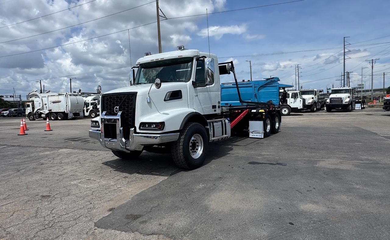 2027 Volvo VHD64B300 60,000 lb. PacMac Roll-off Truck