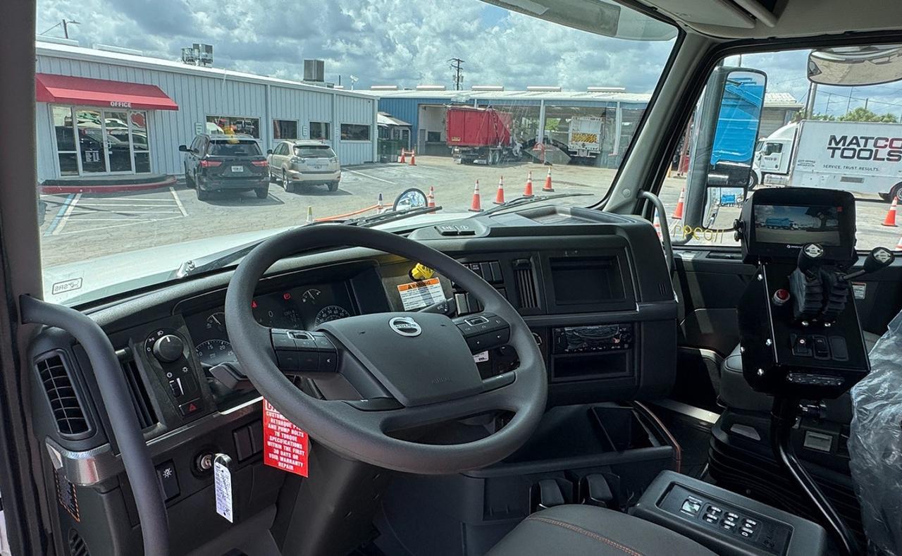 2027 Volvo VHD64B300 60,000 lb. PacMac Roll-off Truck Tampa FL