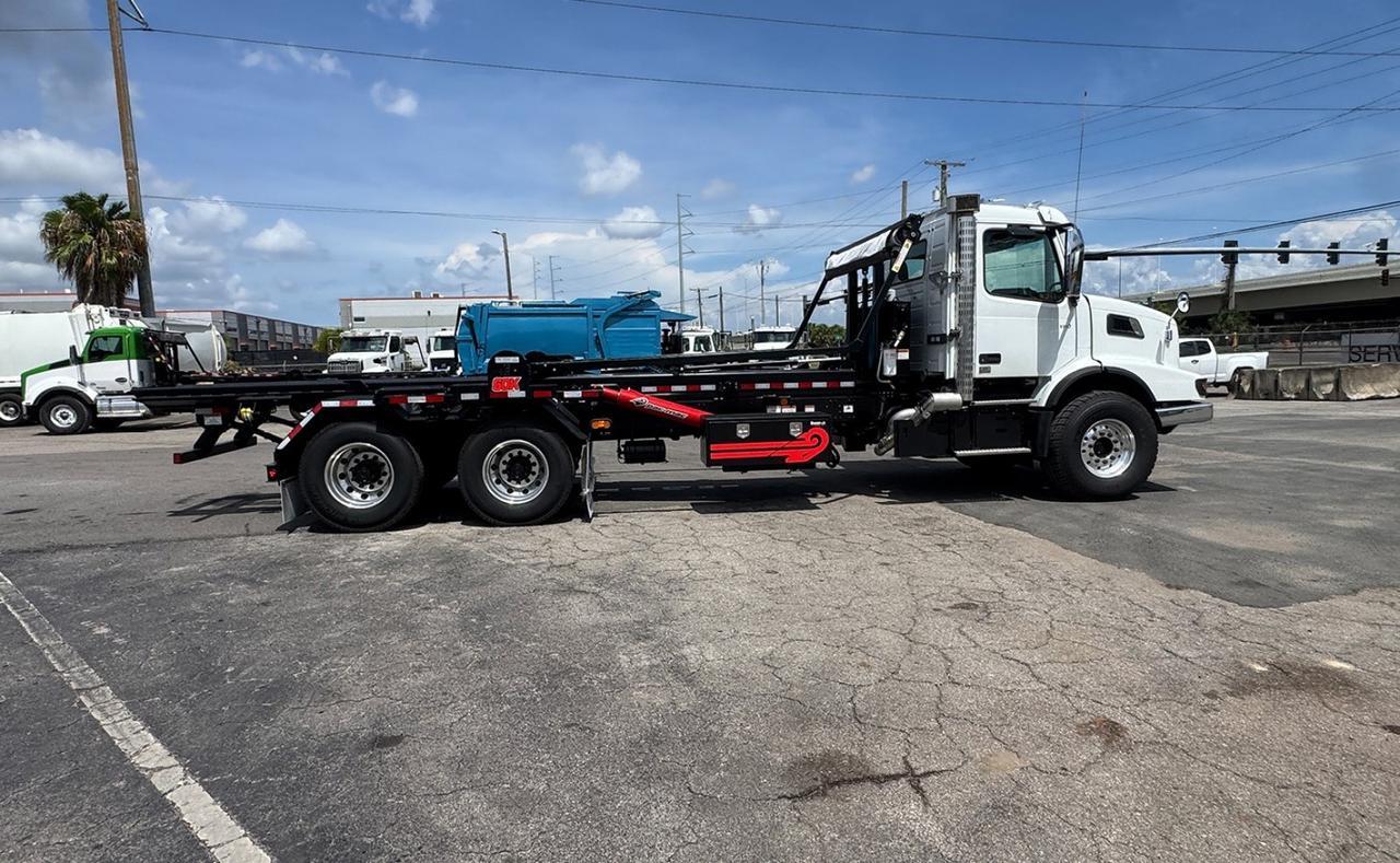 2027 Volvo VHD64B300 60,000 lb. PacMac Roll-off Truck